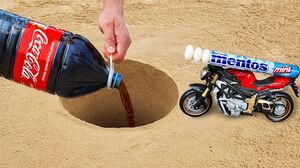 Motorbike with Mentos vs Coca-Cola in a Hole