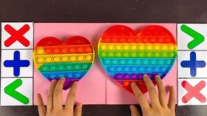 Mini vs Giant Rainbow Heart Pop Its